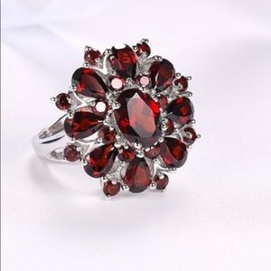 Stunning 925 Silver and lab created ruby ring.